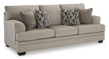 Ashley Furniture Stonemeade Sofa with plush cushions and neutral fabric, showcasing a modern living room setting.