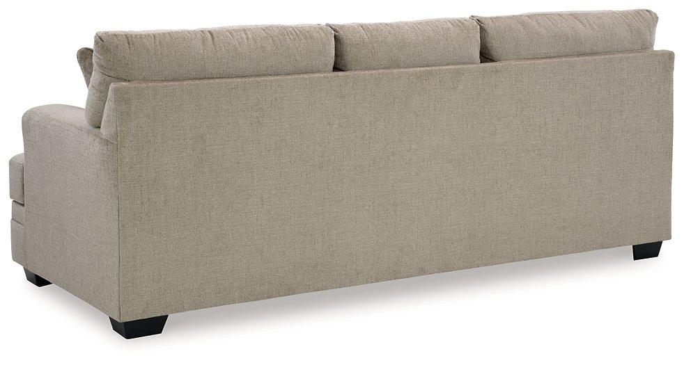 Ashley Furniture Stonemeade sofa with plush fabric and cushioned seating, shown in a stylish living room setting.