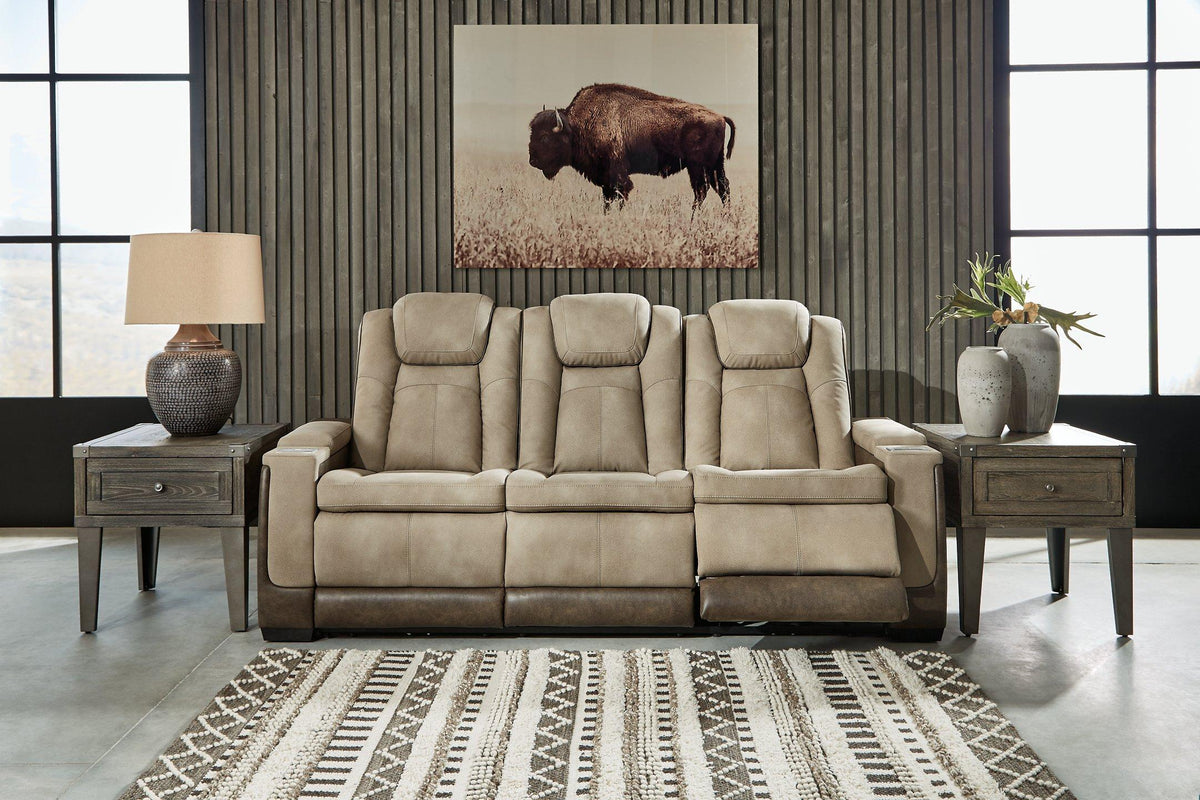 Ashley Furniture Next-Gen DuraPella power reclining sofa with plush cushions and reclining features in a modern living room setting.