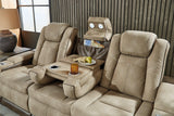 Ashley Furniture Next-Gen DuraPella Power Reclining Sofa with plush upholstery and reclining features, shown from a front angle.