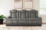 Ashley Furniture Next-Gen DuraPella power reclining sofa with plush cushioning and modern design, shown in a stylish living room setting.
