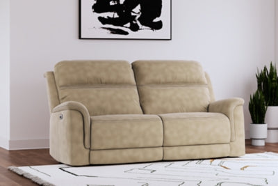 Ashley Furniture Next-Gen DuraPella power reclining sofa with plush cushions and modern design, shown in gray upholstery.