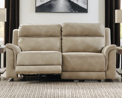 Ashley Furniture Next-Gen DuraPella power reclining sofa with plush cushions and contemporary design, shown in a cropped image.