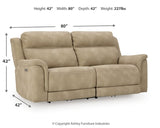 Next-Gen DuraPella Power Reclining Sofa by Ashley Furniture, showing plush gray fabric with padded armrests and reclining features.