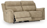 Ashley Furniture Next-Gen DuraPella Power Reclining Sofa shown from an angled open view, featuring plush cushions and reclining mechanisms.