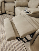 Ashley Furniture Next-Gen DuraPella power reclining sofa with plush cushions and modern design, shown in a neutral fabric.