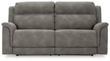 Ashley Furniture Next-Gen DuraPella power reclining sofa with plush cushions and modern design, shown from a front head-on view.