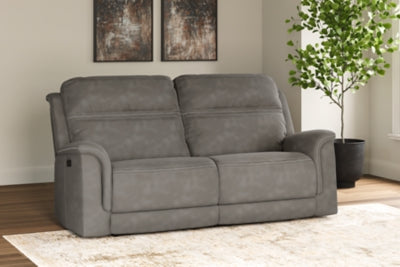 Ashley Furniture Next-Gen DuraPella Power Reclining Sofa with plush cushions and reclining mechanisms in a modern living room setting.