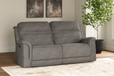 Ashley Furniture Next-Gen DuraPella Power Reclining Sofa with plush cushions and reclining mechanisms in a modern living room setting.