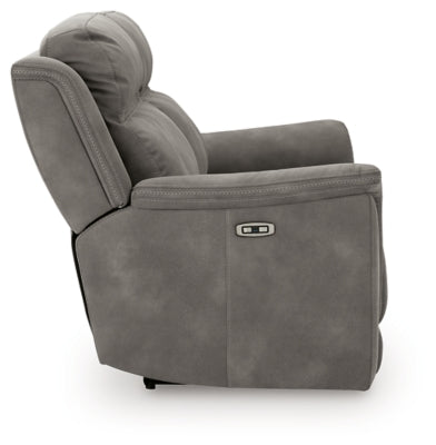 Ashley Furniture Next-Gen DuraPella Power Reclining Sofa with plush cushions and reclining features, shown from side view.