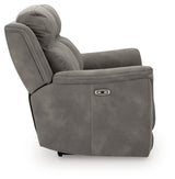 Ashley Furniture Next-Gen DuraPella Power Reclining Sofa with plush cushions and reclining features, shown from side view.