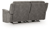 Back view of Ashley Furniture Next-Gen DuraPella Power Reclining Sofa with plush cushions and reclining mechanism.