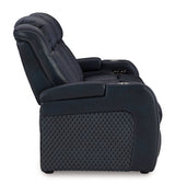 Ashley Furniture Fyne-Dyme Power Reclining Sofa with plush cushions and reclining features, shown from the side.