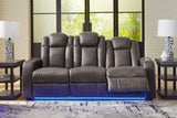 Ashley Furniture Fyne-Dyme Power Reclining Sofa showing plush gray upholstery and powered reclining features.