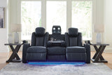 Ashley Furniture Fyne-Dyme Power Reclining Sofa with plush cushions and reclining features, shown in a modern living room setting