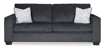 Ashley Furniture Altari Sofa with plush cushions and modern design, shown in a cozy living room setting.