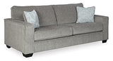Ashley Furniture Altari sofa with plush cushions and contemporary design, shown in a stylish living room setting.
