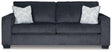 Ashley Furniture Altari sofa with plush cushions and neutral fabric, showcasing a modern living room setting.