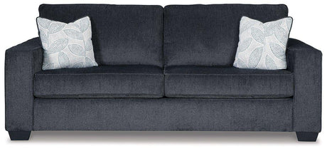 Ashley Furniture Altari sofa with plush cushions and neutral fabric, showcasing a modern living room setting.