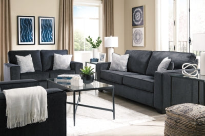 Ashley Furniture Altari sofa with plush cushions and modern design, shown in a cozy living room setting.