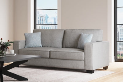 Ashley Furniture Altari sofa with plush upholstery and modern design, shown in a neutral color for stylish living room decor.