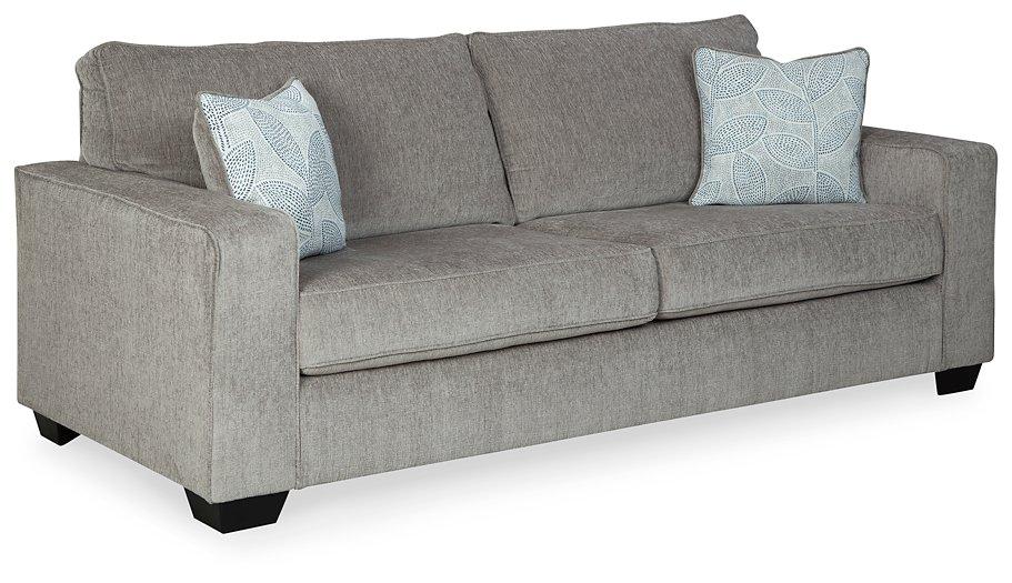 Ashley Furniture Altari sofa with plush fabric, featuring a modern design and comfortable cushioning in a stylish living room setting.