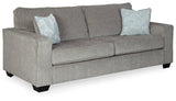 Ashley Furniture Altari sofa with plush fabric, featuring a modern design and comfortable cushioning in a stylish living room setting.
