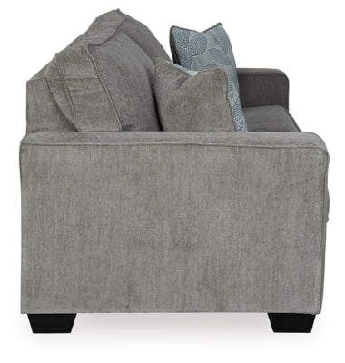 Ashley Furniture Altari sofa with plush cushions and modern design, shown from a side angle in a stylish living room setting.