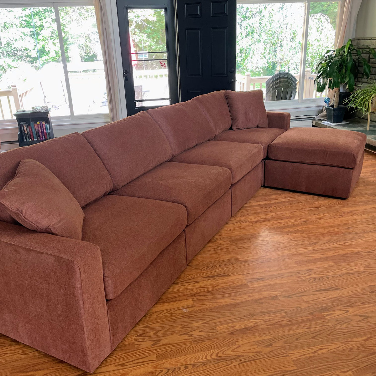 Ashley Furniture Modmax sectional sofa in spice color, 4-piece sofa set with plush cushions and modern design.