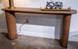 Ashley Furniture Dontayne sofa table with sleek wooden finish and modern design, perfect for living room decor.