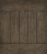 Ashley Furniture Johnelle sofa table with a sleek wooden surface and sturdy legs, perfect for living room decor.