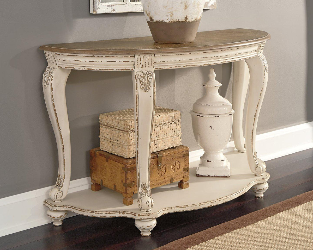 Ashley Furniture Realyn sofa table with a wooden top and metal legs, ideal for living room decor.
