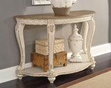Ashley Furniture Realyn sofa table with a wooden top and metal legs, ideal for living room decor.