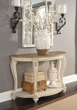 Ashley Furniture Realyn sofa table with wood finish and sleek design, perfect for living room decor and functional space.