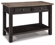 Ashley Furniture Tyler Creek sofa table showing a wooden console with a smooth finish and storage drawers.