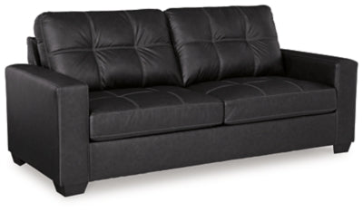 Ashley Furniture Barlin Mills sofa shown from an angled side view with plush cushions and fabric upholstery.