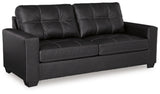 Ashley Furniture Barlin Mills sofa shown from an angled side view with plush cushions and fabric upholstery.