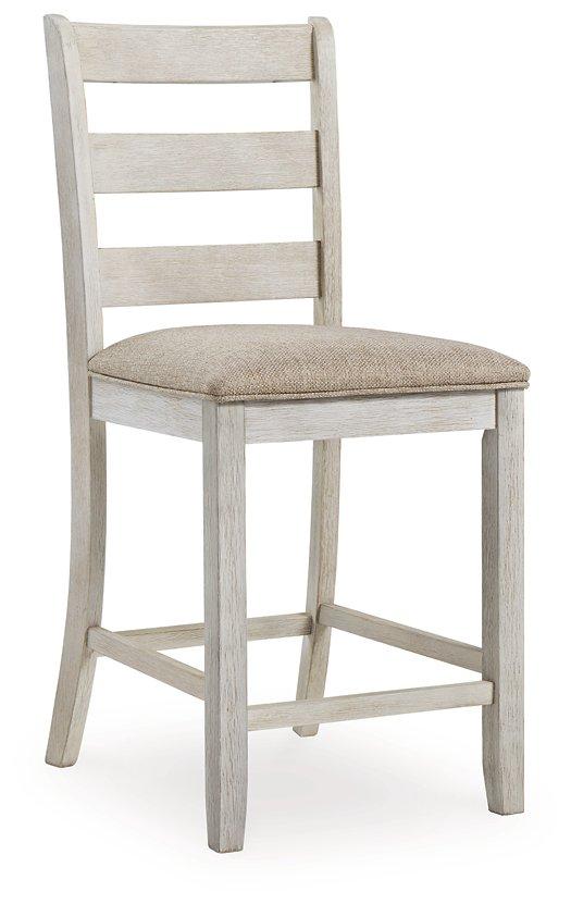 Ashley Furniture Skempton counter height bar stool with wooden legs and upholstered seat, ideal for kitchen or bar area.