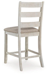 Ashley Furniture Skempton counter height bar stool with wooden legs and a cushioned seat, ideal for kitchen or bar areas.