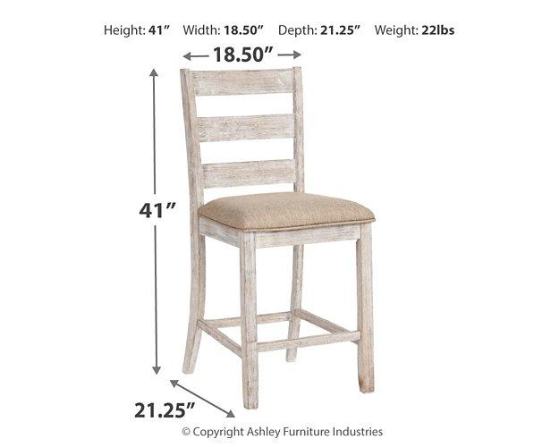 Ashley Furniture Skempton counter height bar stool with wooden legs and cushioned seat, ideal for kitchen or bar area.