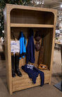 Ashley Furniture Dovander Hall Tree with storage bench, featuring hooks, shelves, and seating for entryway organization.