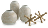 Set of five Ashley Furniture Vinburn table accessories including coasters, placemats, and decorative items on a wooden table.