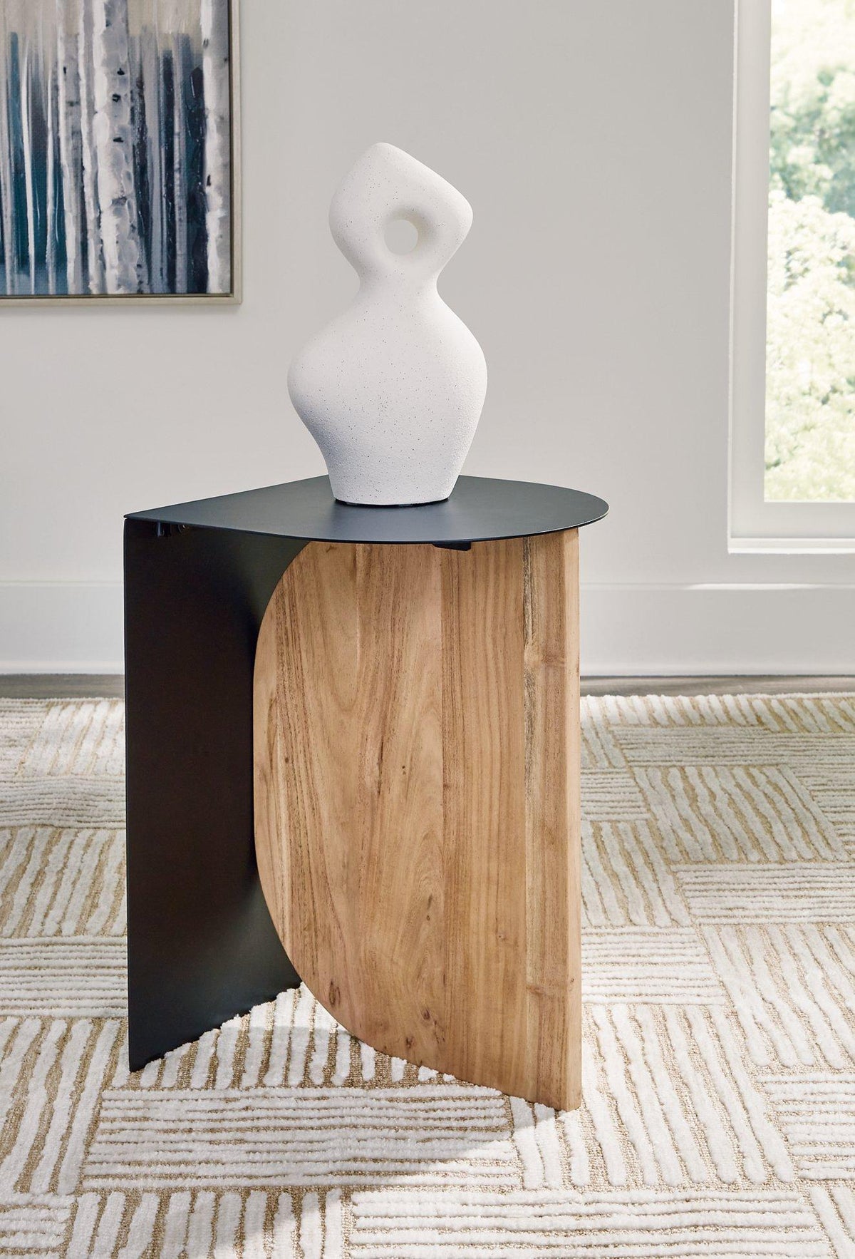 Ashley Furniture Ladgate Accent Table with a smooth wooden surface and stylish legs, ideal for living room decor.