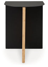 Ashley Furniture Ladgate accent table with a round wooden top and sleek metal legs, ideal for living room or bedroom decor.
