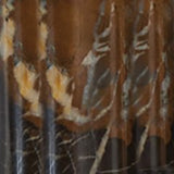Ashley Furniture Alanbert table lamp with a sleek design and fabric shade, shown in a swatch sample image.