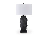 Amillion table lamp with a sleek design and fabric shade, featuring a stylish base perfect for living room or bedside decor.
