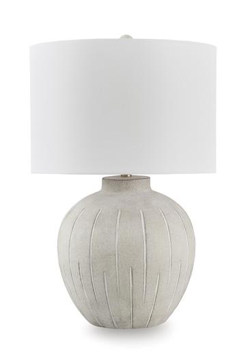 Calbert table lamp by Ashley Furniture with a sleek base and fabric shade, ideal for modern living room or bedroom decor.