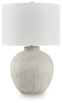Ashley Furniture Calbert Table Lamp with a sleek design, featuring a fabric shade and modern base for stylish lighting.