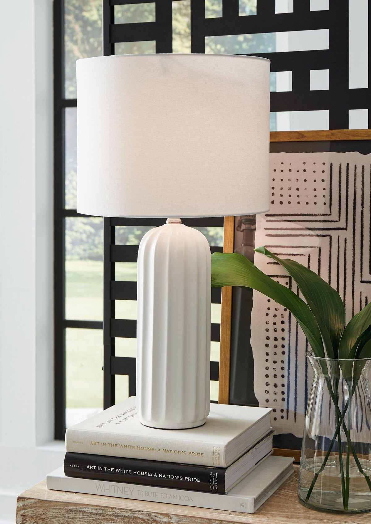 Set of two Clarkland table lamps by Ashley Furniture featuring classic design with fabric shades and wood bases.
