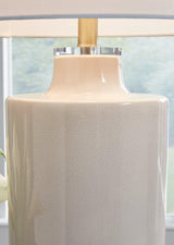 Ashley Furniture Cylener table lamp with a sleek base and fabric shade, ideal for modern living room or bedroom decor.